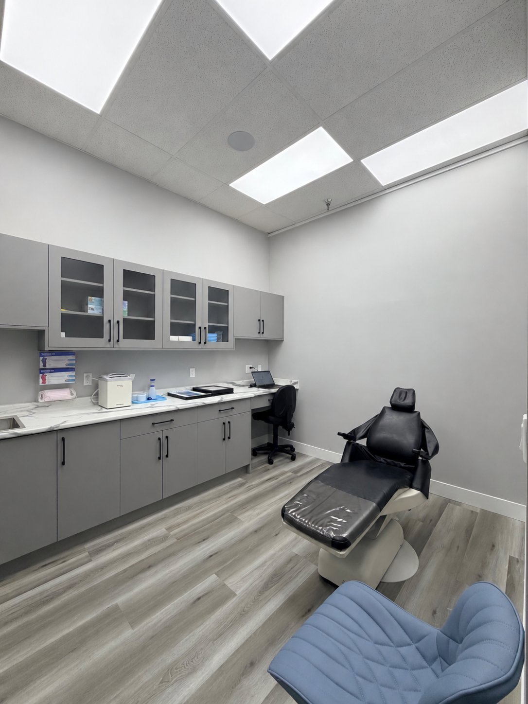 Second treatment room with cabinetry at NuBite Denture Clinic in Langley